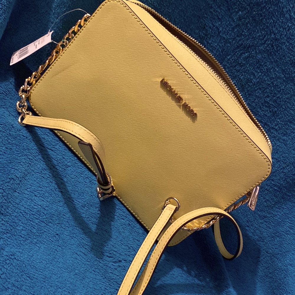 Large Michael kors cross body leather sunshine with matching double zip wristlet